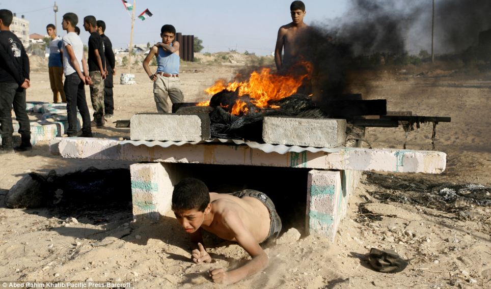 The summer camps are taking place in the Southern Gaza Strip with thousands of school kids expected to attend the military exercises and training activities