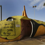 A bomb shelter decorated as a serpent stretches across a public playground in the Israeli town of Sderot, April 7, 2014. REUTERS/Finbarr O’Reilly