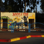 A bus stop decorated with graffiti and built from reinforced concrete doubles as a bomb shelter in the Israeli town of Sderot, April 4, 2014. REUTERS/Finbarr O’Reilly